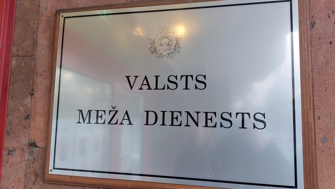 VMD uzraksts pie sienas