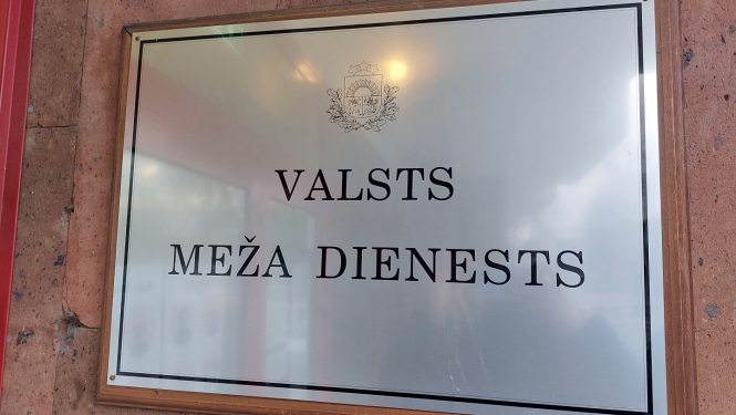 VMD uzraksts pie sienas